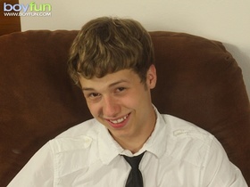 Twink Levi Lee masturbates wearing only his tie.