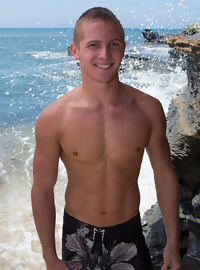 Cute blond surfer  Noel strokes at Sean Cody