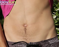 Cute boy Desmond Hall busts a nut in the backyard