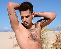 Two horny lads catch some rays