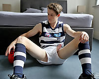 Hung Aussie boy Brad Hunter stripping out of his footy gear