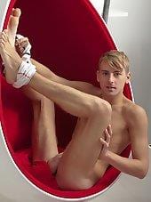 Cute blond Constantine blows huge load over his stomach